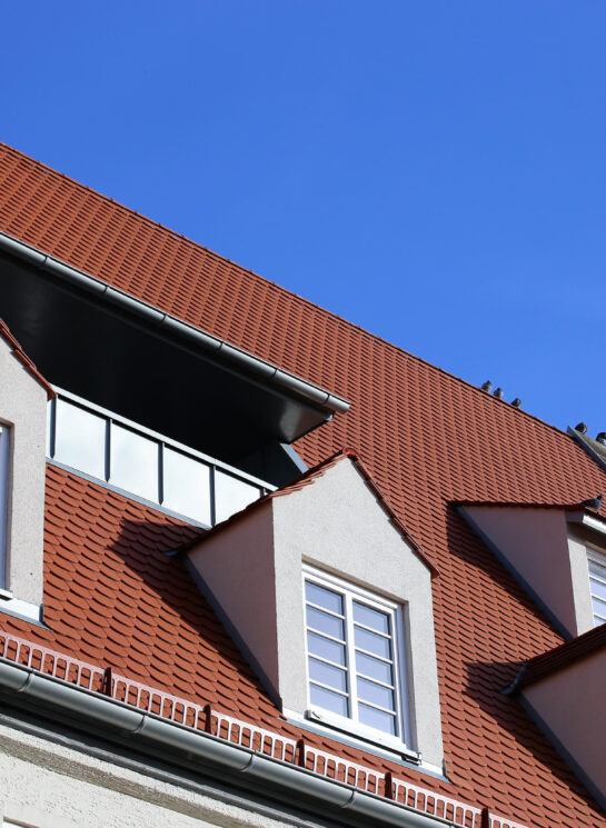 Red tile roof with dormer Red tile roof with dormer